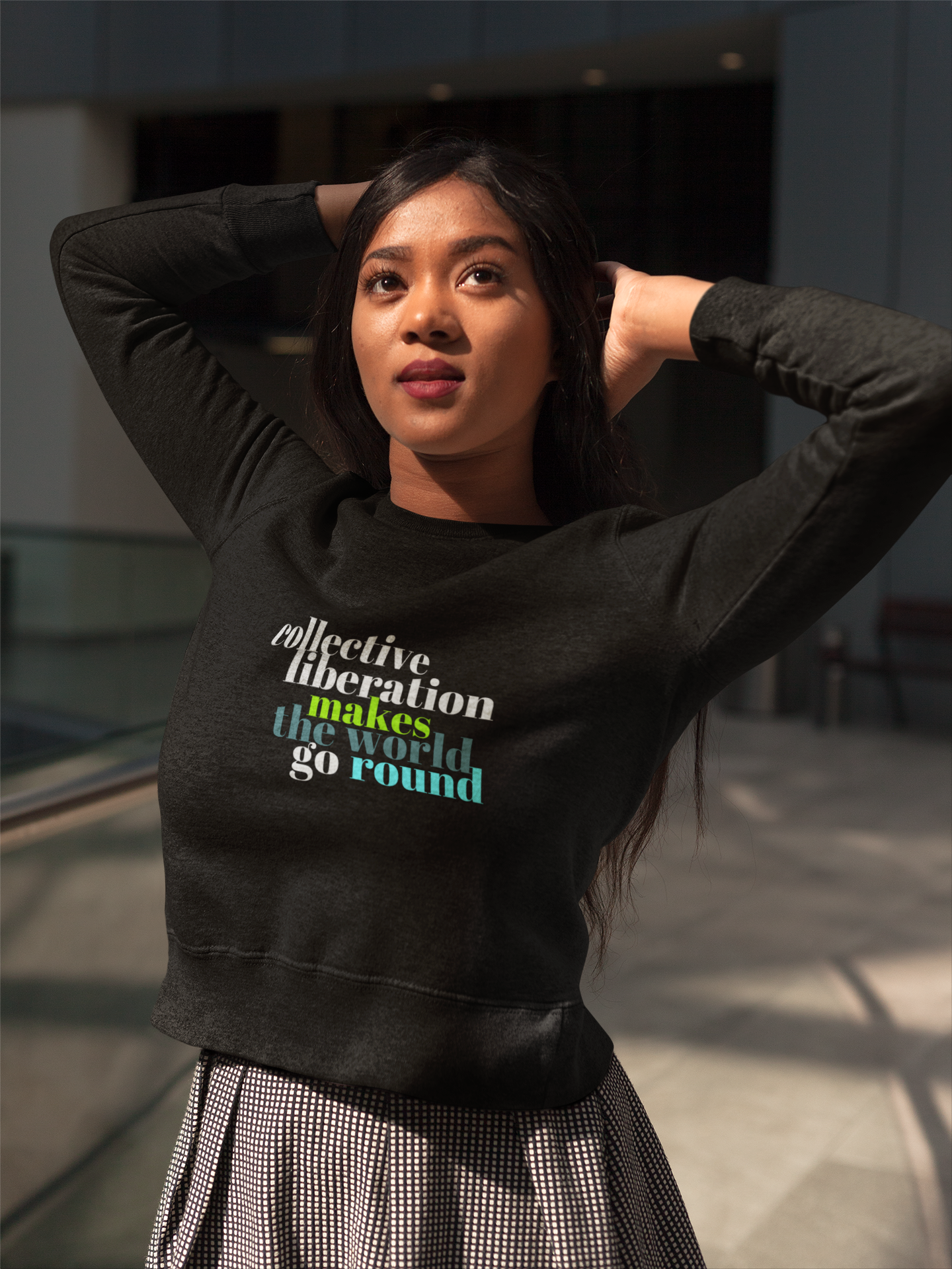 Collective Liberation Makes the World Go Round Black Unisex Organic Sweatshirt